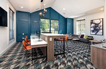 Business center with mac/pcs and wireless printing
